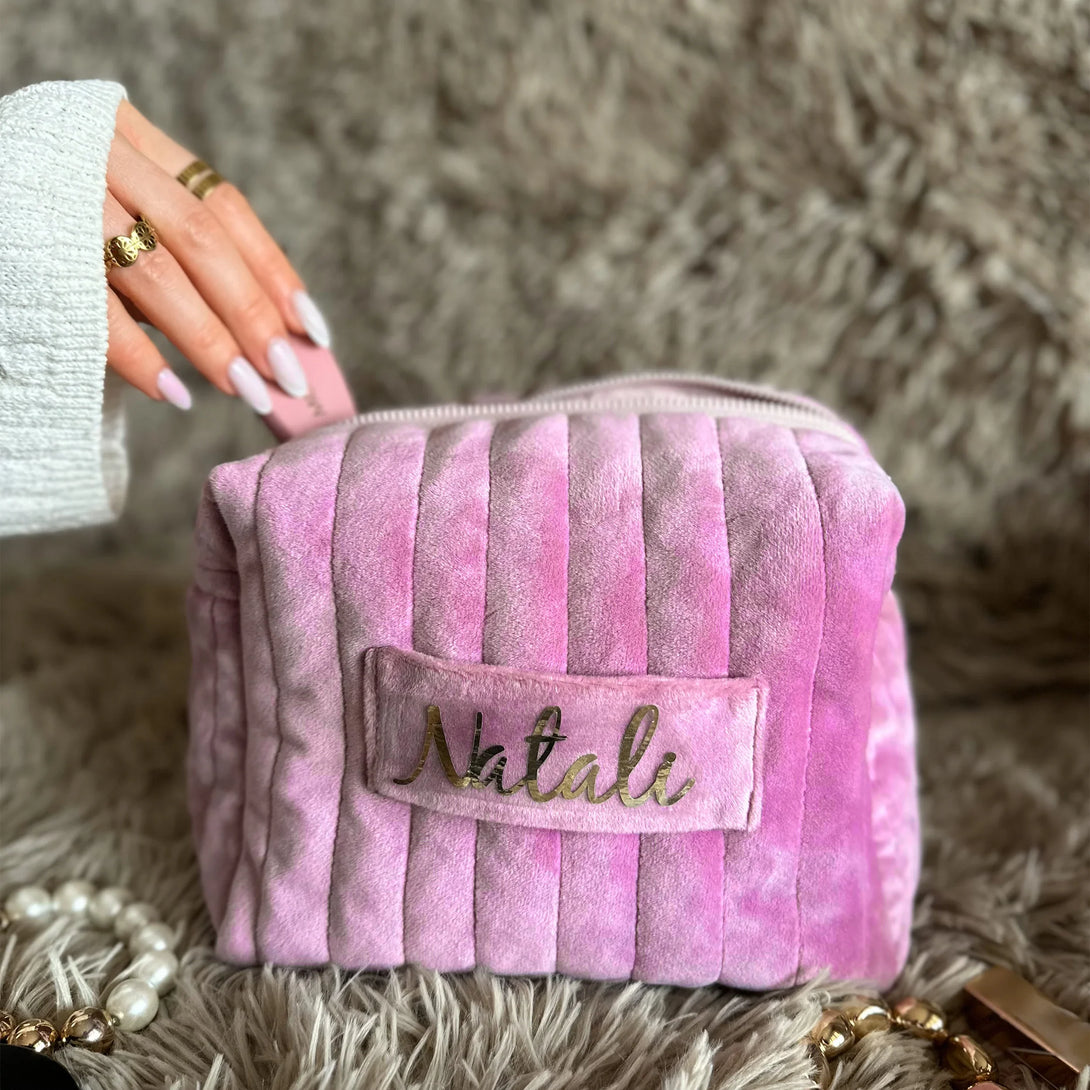 personalized pink quilted leather wallet gift for men with gold name Natali on soft background